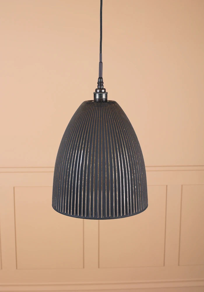 Large black and gold bell shaped ribbed glass bathroom pendant light with antique bronze lamp holder and black fabric flex.