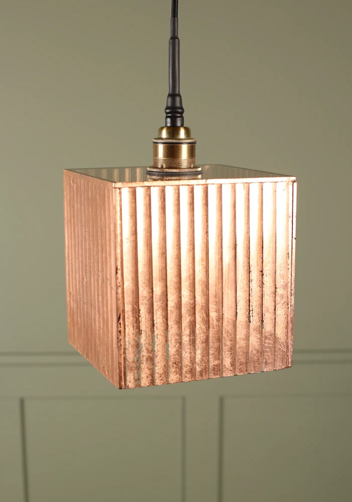 Large cube copper leaf bathroom pendant light with brushed brass lamp holder.