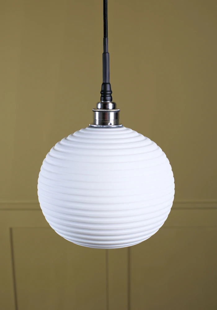 Large spherical porcelain bathroom pendant light with brushed nickel lamp holder.