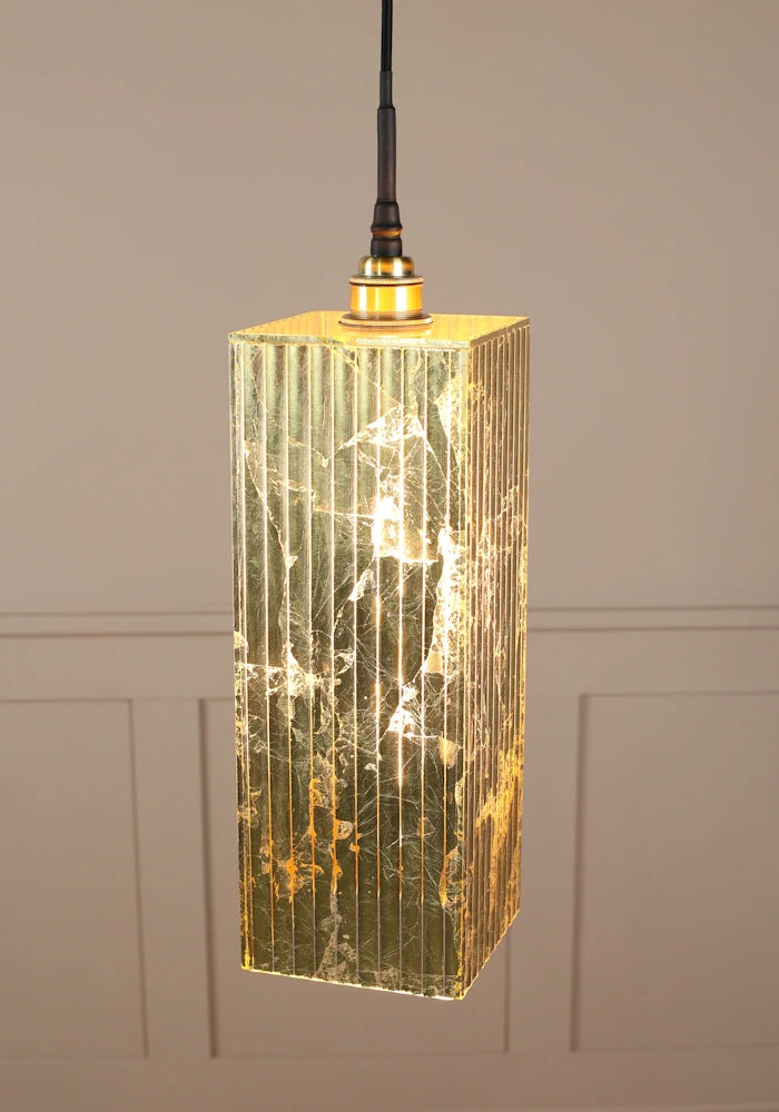 Large rectangular gold leaf bathroom pendant light with brushed brass lamp holder.