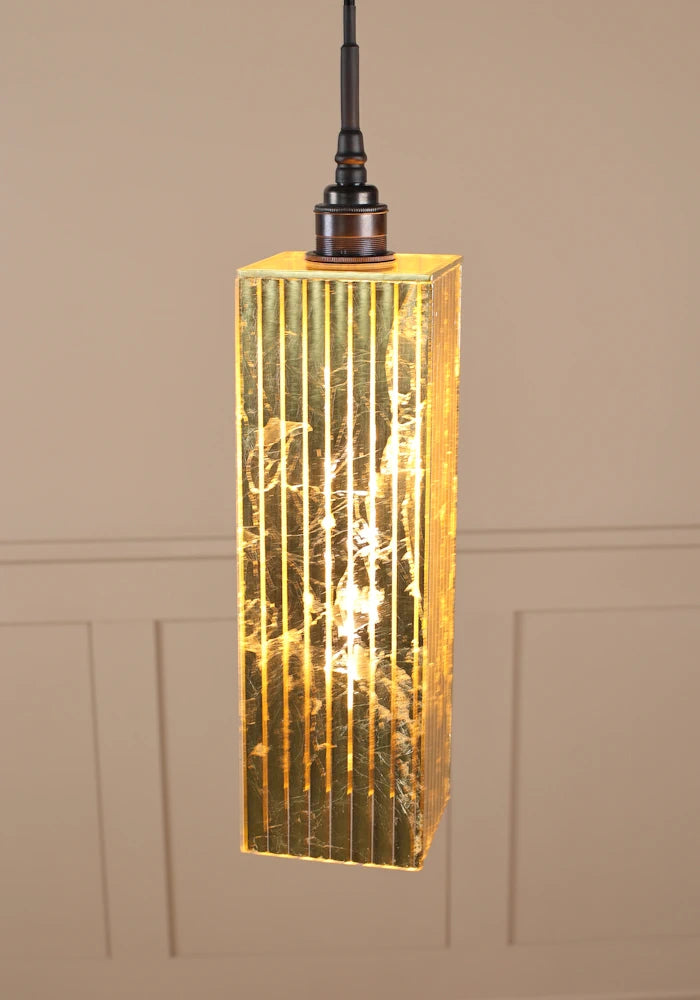 Long rectangular gold leaf bathroom pendant light with antique bronze lamp holder.