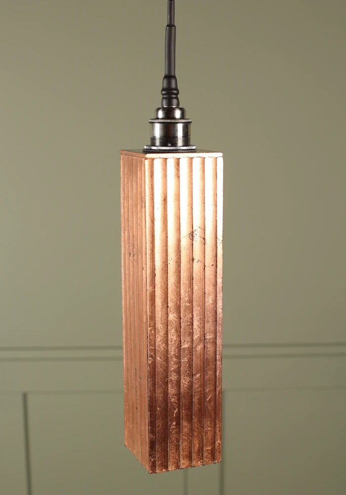 Long rectangular copper leaf bathroom pendant light with brushed nickel lamp holder.