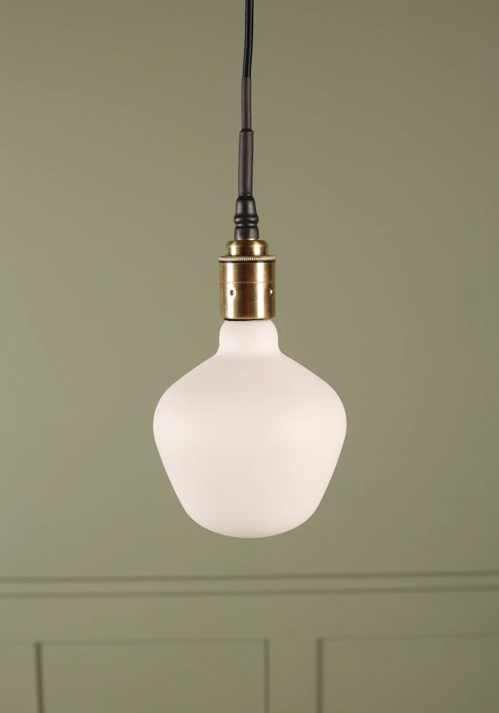 Tala Enno bathroom pendant light with brushed brass lamp holder.